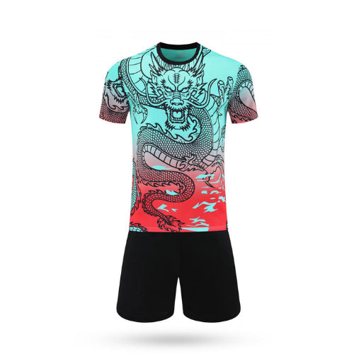 T-shirt with dragon design and black shorts on a white background