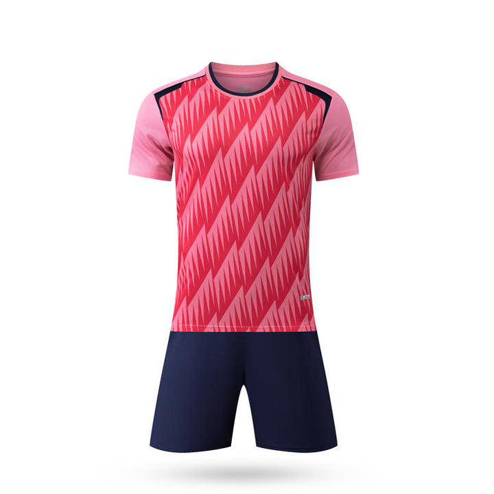 Pink and navy sports outfit with a patterned shirt and shorts on a white background