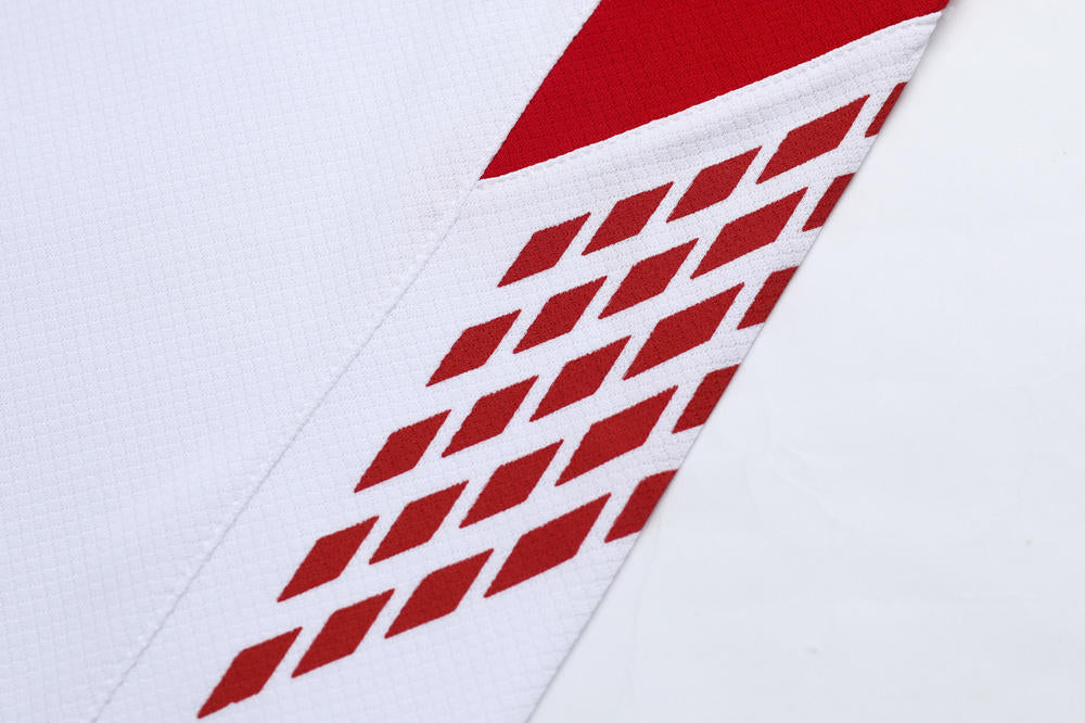 Red geometric pattern on a white background