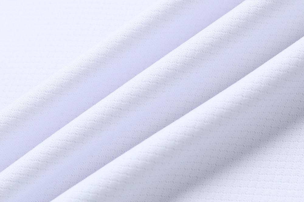 Close-up of white fabric with folds