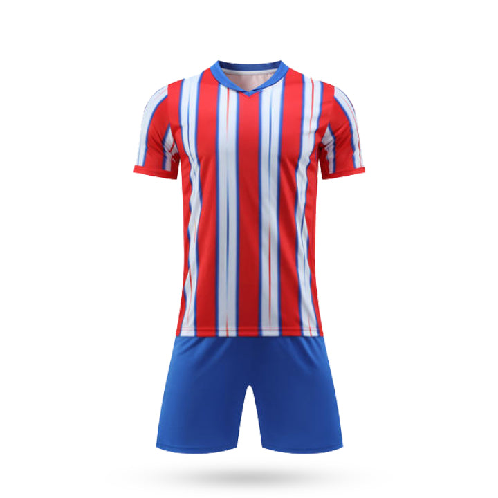 Front view of Crimson Storm soccer kit featuring red and white vertical stripes with blue accents and royal blue shorts.