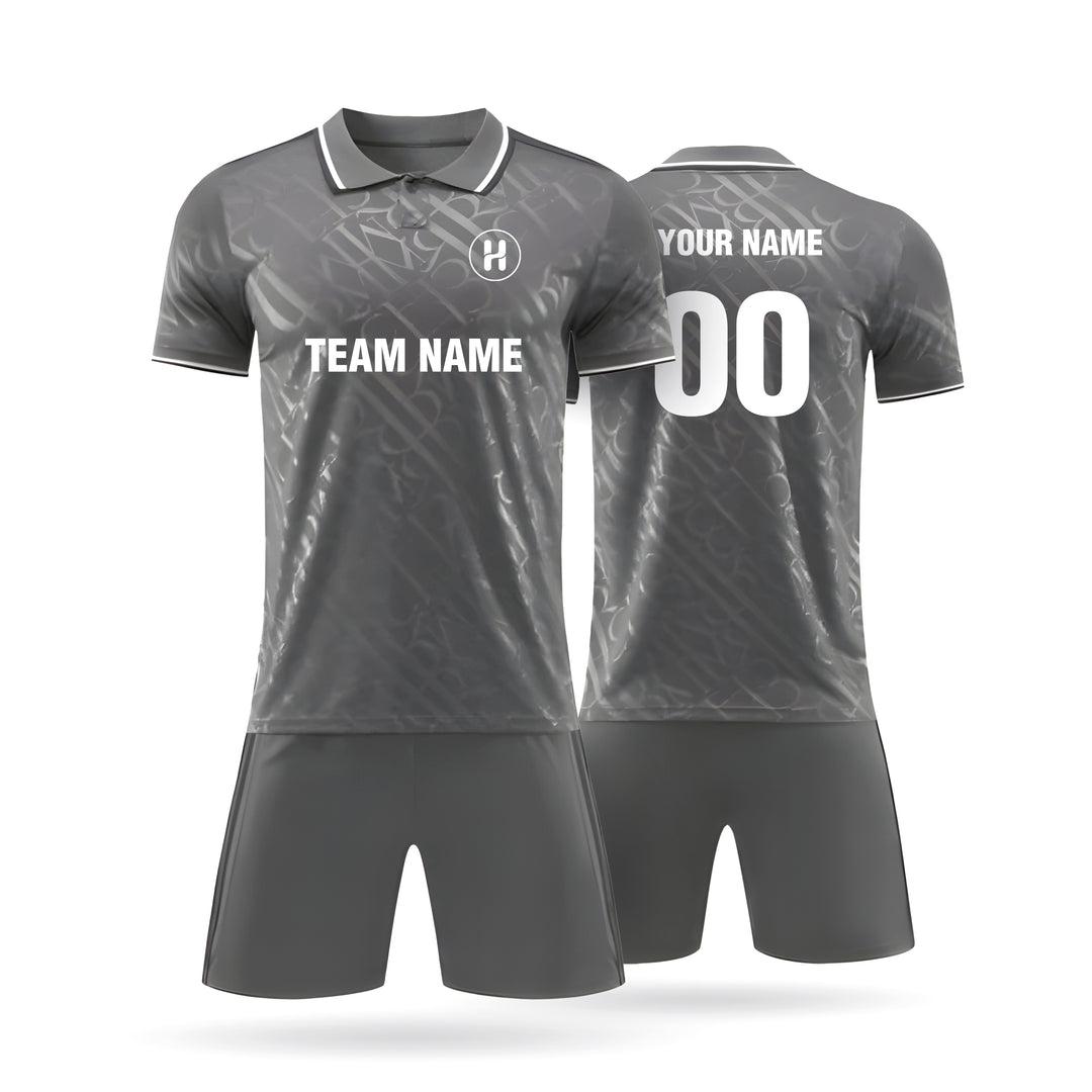 Full set view of the Custom Nightcrest fan style soccer jersey in black, featuring white abstract shoulder patterns and customizable team name and player number.