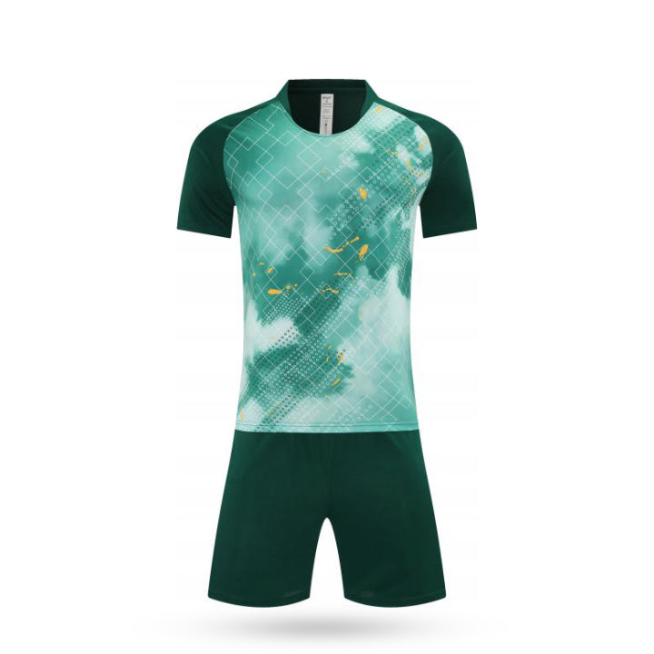 Front view of kids performance soccer kit featuring a green and white diagonal stripe jersey and green shorts.