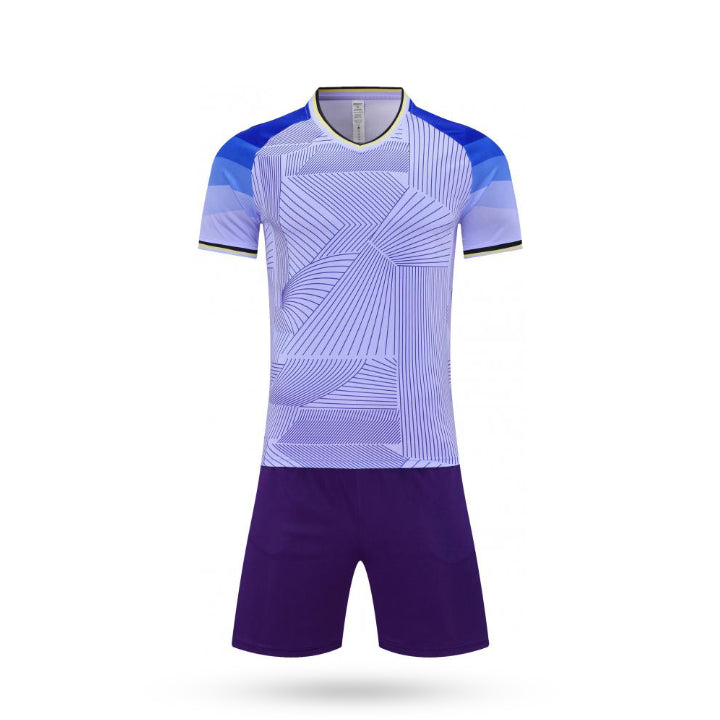 Complete set view of the Sky Break kids game purple kit featuring a white gradient pattern with purple short.