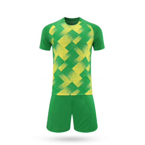 Mint green Torque Pass soccer jersey with a dark navy geometric pattern and navy blue shorts.